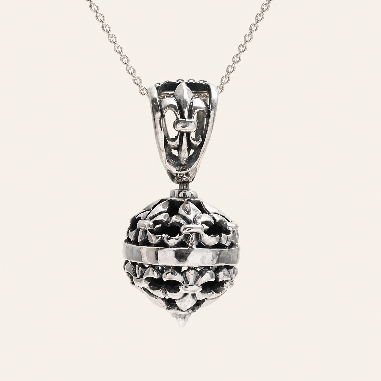 Spinning Fleur-de-Lis Silver Pendant