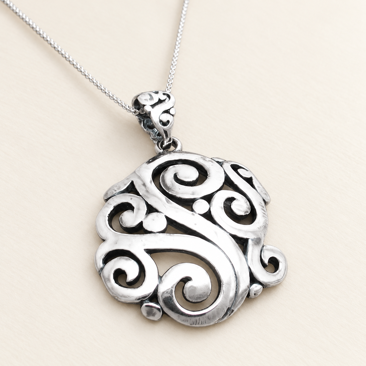 Domed Swirl and Dot Silver Pendant